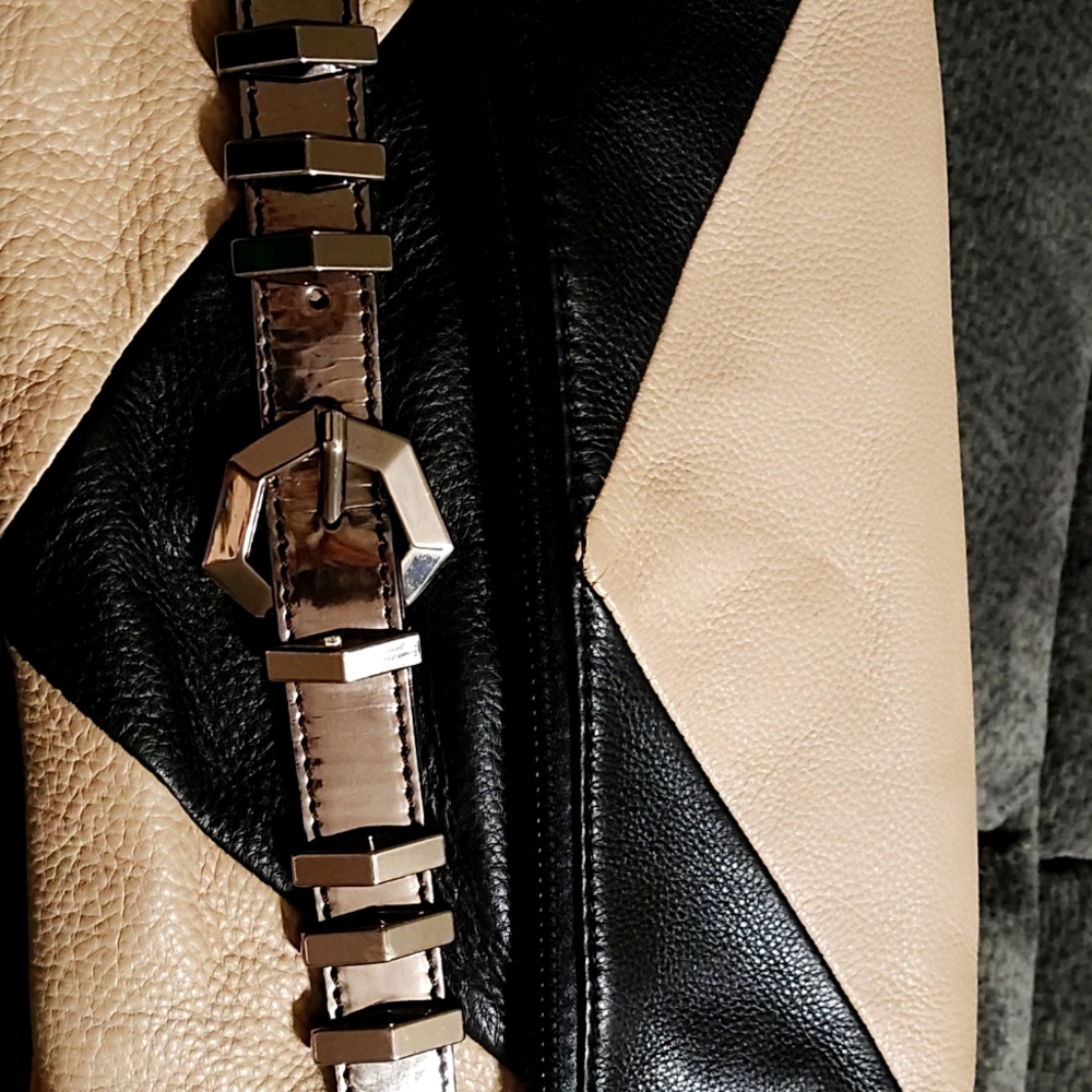 Oryany tan black leather purse or clutch